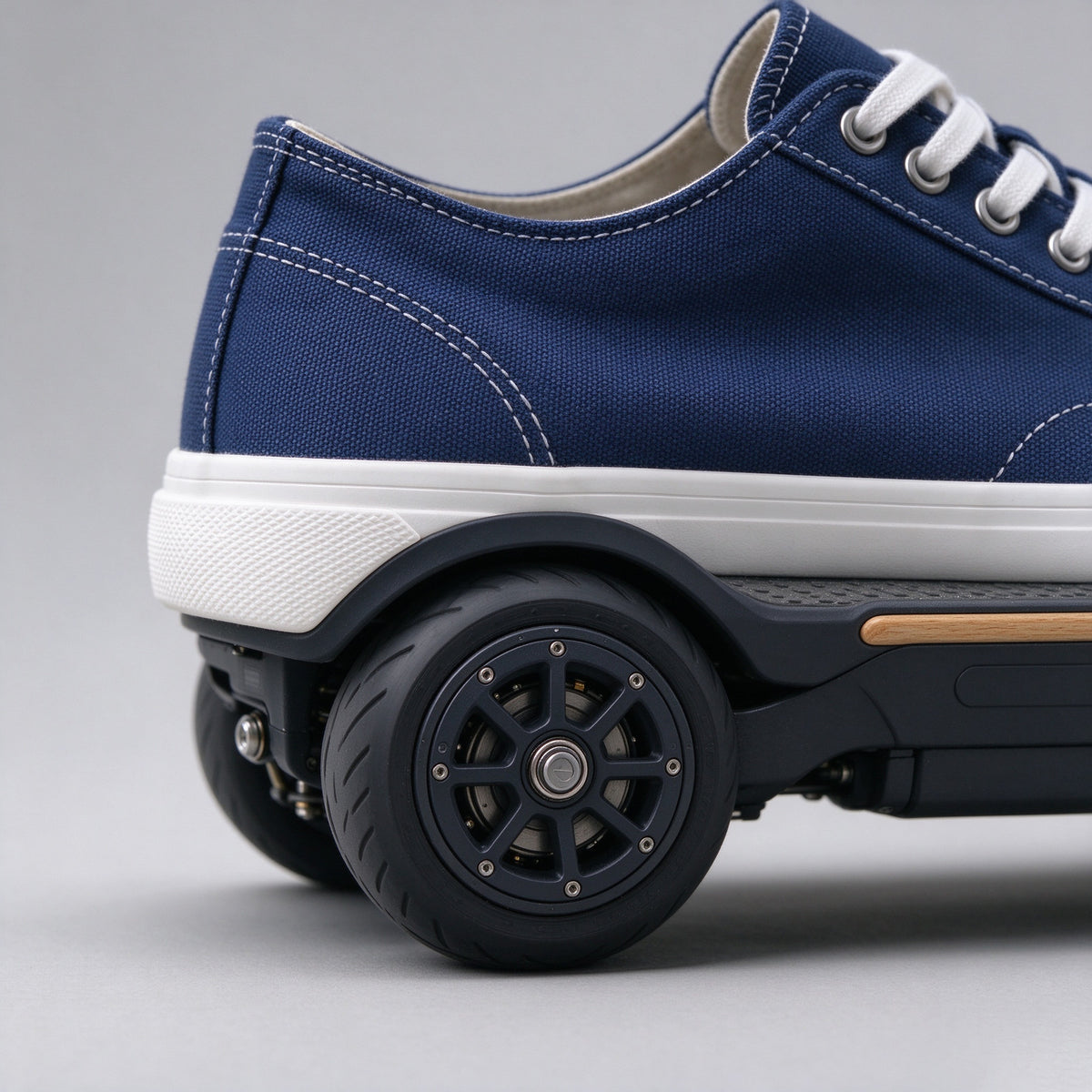 Close-up of the navy canvas upper, white toe cap and heel wheel